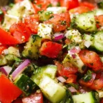 Colorful Mediterranean Salad with olives, tomatoes, cucumber, and feta cheese.